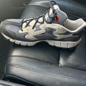 Men grey and navy Nike sneakers